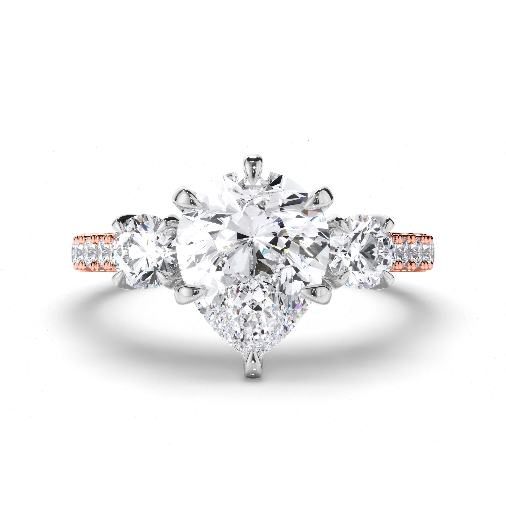 Pear Diamond Trilogy Engagement Ring with Round sides and Cut Claw Band