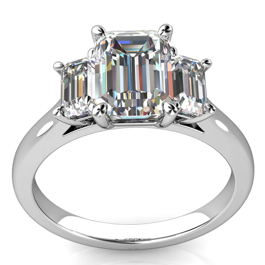 Emerald Cut Trilogy Diamond Engagement Ring, 4 Pear Claws Set with Emerald Cut Side Stones on a Classic Underrail Setting.