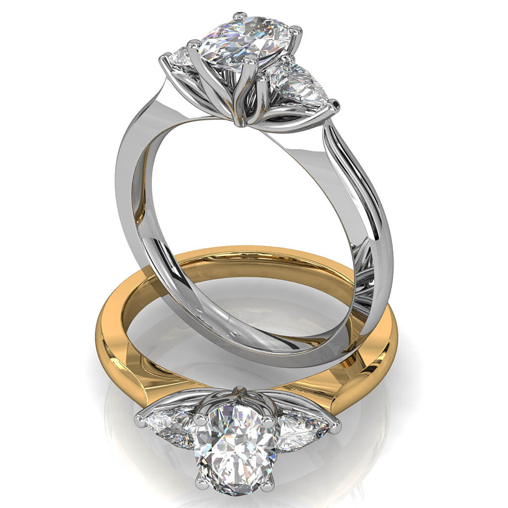 Oval Cut Trilogy Diamond Engagement Ring, with Pear Shape Side Stones and Lotus Setting Detail.