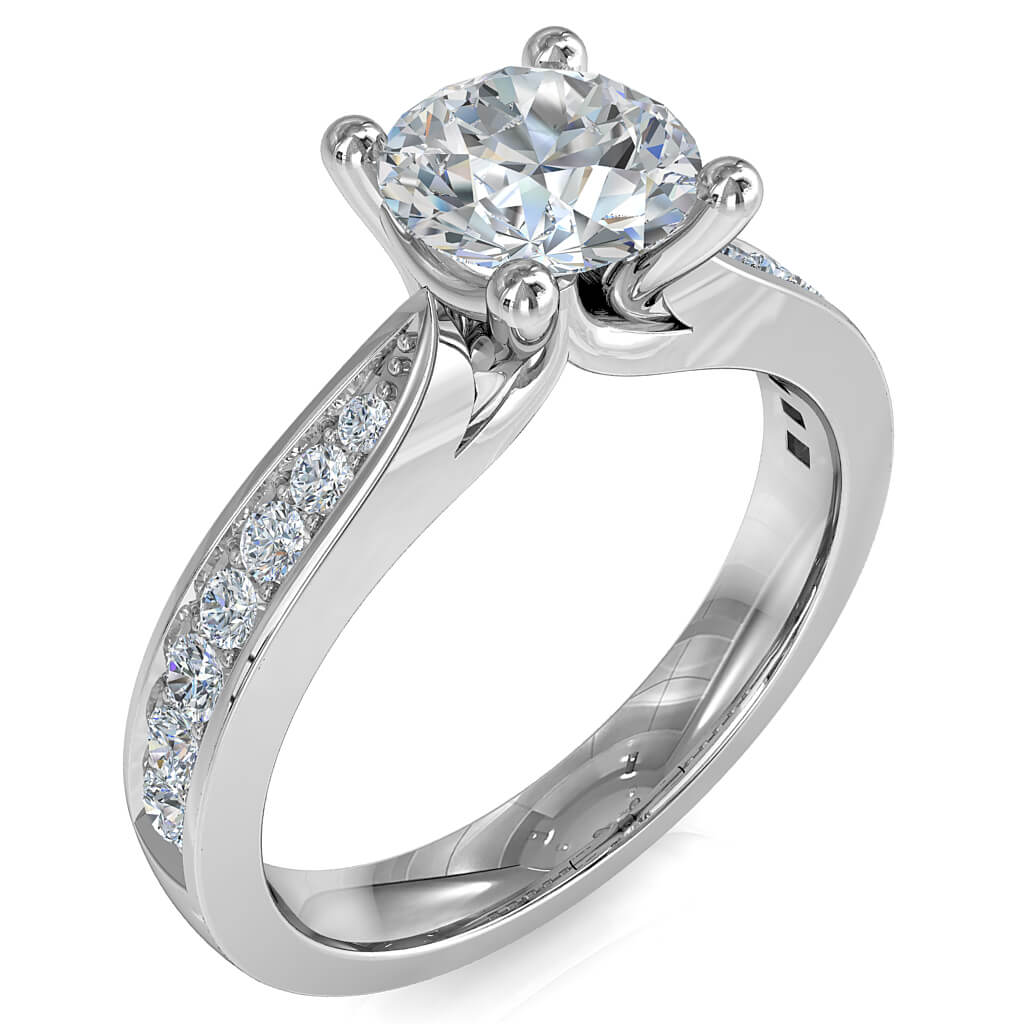 Round Brilliant Cut Solitaire Diamond Engagement Ring, 4 Button Claws Set on a Wide Pinched Bead Set Band.