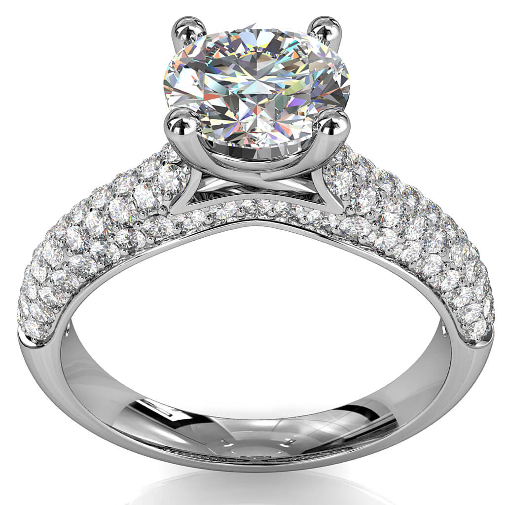 Round Brilliant Cut Solitaire Diamond Engagement Ring, 4 Claws Set on Four Row Pavé Band with Diamond Outer Band Details.