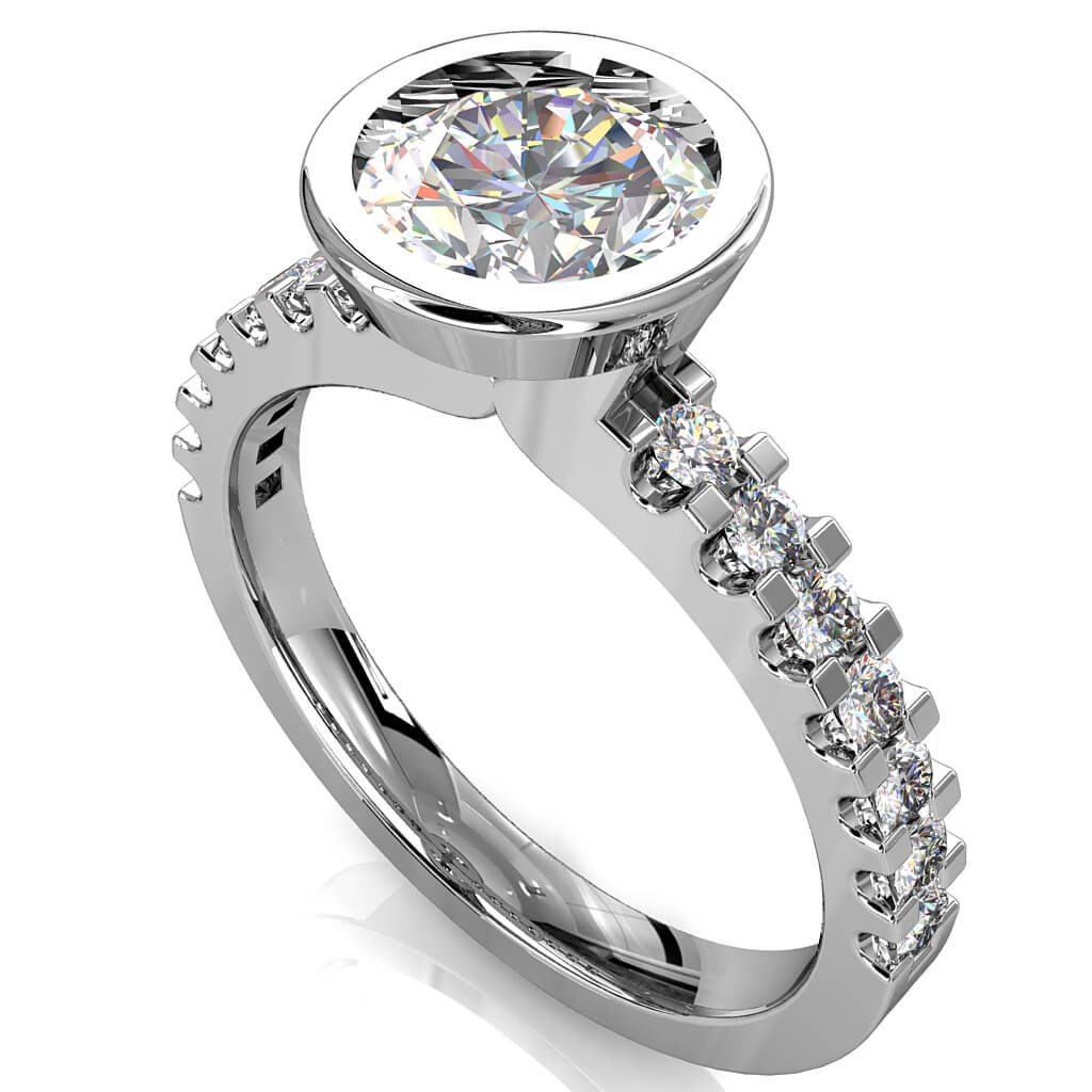 Round Brilliant Cut Diamond Solitaire Engagement Ring, Bezel Set on a Heavy Cut Claw Band.