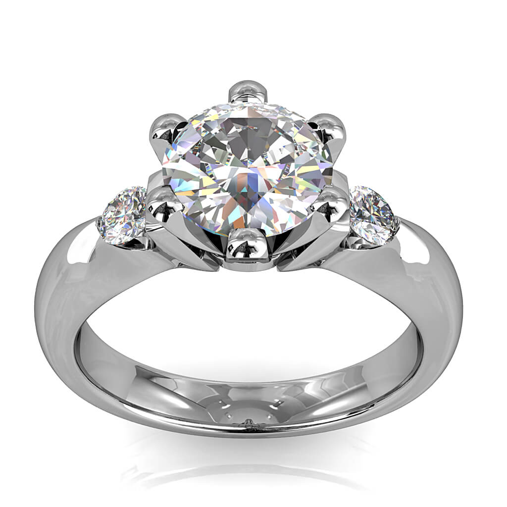 Round Brilliant Cut Diamond Trilogy Engagement Ring, Stones 6 Claw Set with Tension Set Side Stones and a Diamond Set Classic Undersetting.