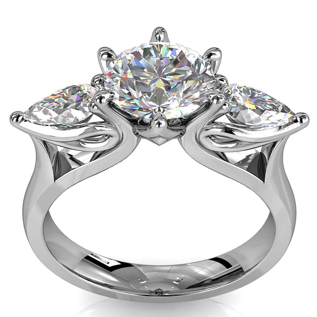 Round Brilliant Cut Diamond Trilogy Engagement Ring, Stones 6 Claw Set with Pear Side Stones on a Tapered Flat Band with Lotus Flower Undersetting.