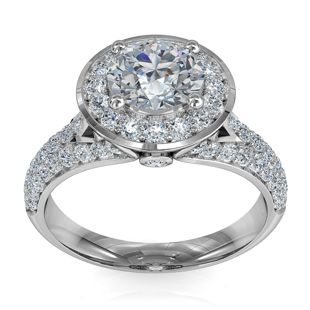 Round Brilliant Cut Halo Diamond Engagement Ring, 4 Claw Set in a Bead Set Halo on Split Pave Band with Hidden Diamond Undersetting.