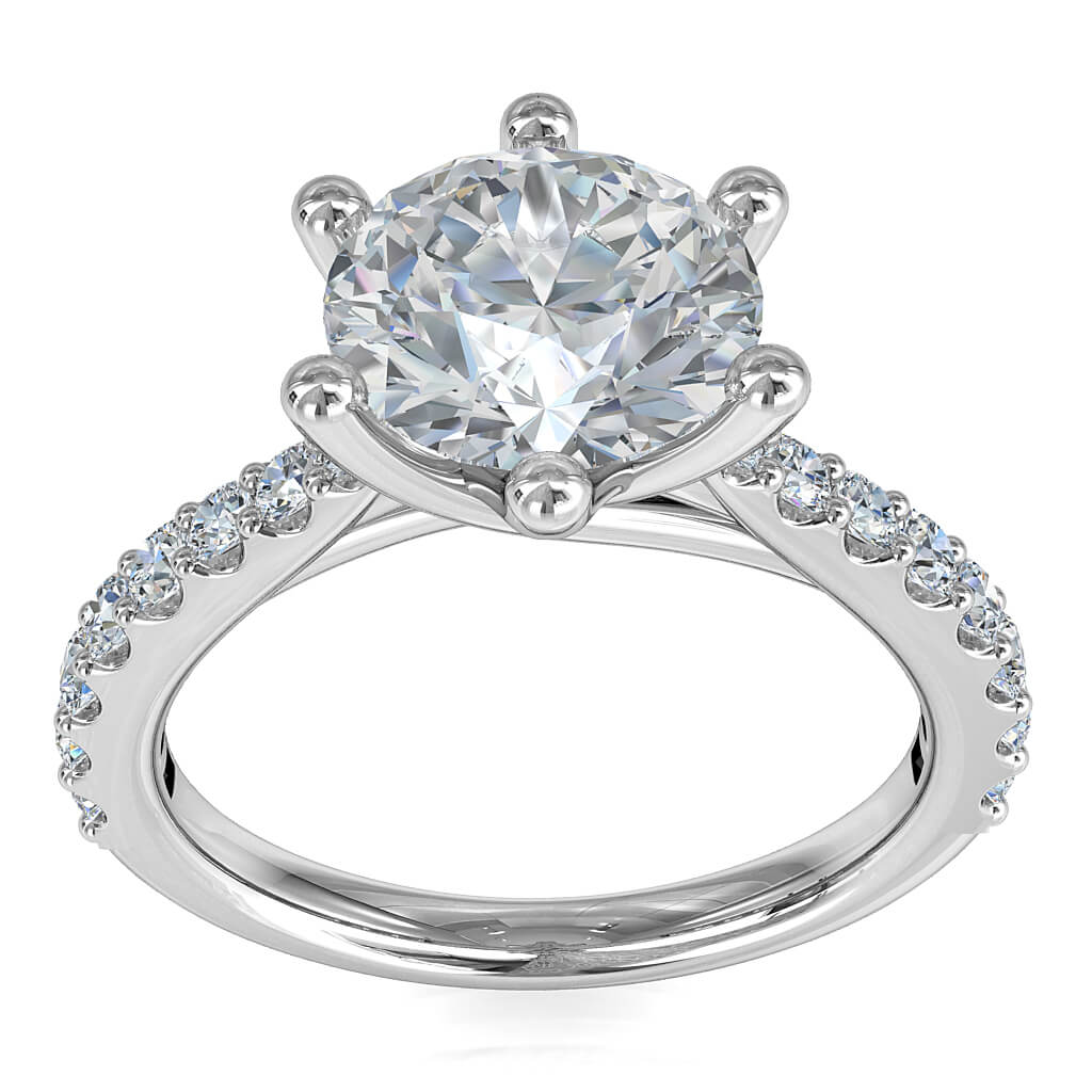 Round Brilliant Cut Solitaire Diamond Engagement Ring, 6 Button Claws Set on a Slightly Tapered Cut Claw Band with Sweeping Fountain Undersetting.