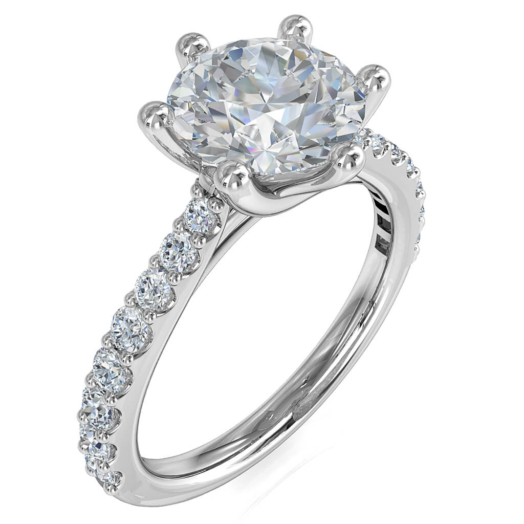 Round Brilliant Cut Solitaire Diamond Engagement Ring, 6 Button Claws Set on a Slightly Tapered Cut Claw Band with Sweeping Fountain Undersetting.