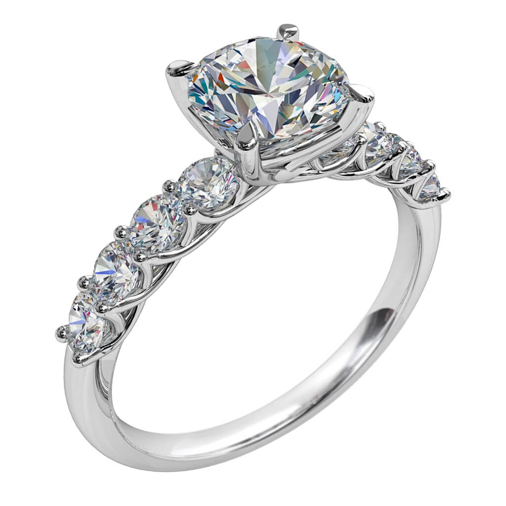 Round Brilliant Cut Solitaire Diamond Engagement Ring, 4 Pear Shaped Claws Set on Sweeping Cut Claw Band.