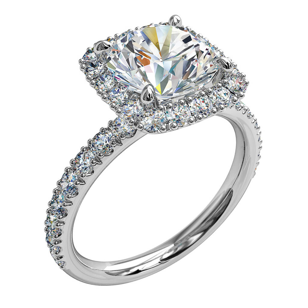 Round Brilliant Cut Diamond Halo Engagement Ring, 4 Pear Shaped Claws Set in a Cushion Shape Cut Claw Halo on a Fine Cut Claw band with a Classic Support Bar Undersetting.