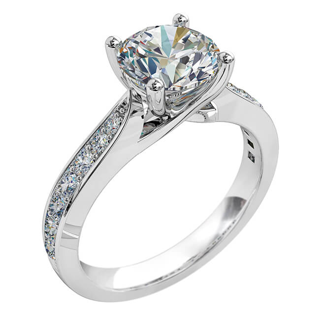 Round Brilliant Cut Solitaire Diamond Engagement Ring, 4 Button Claws Set on a Tapered Bead Set Band with Crossover Undersetting.