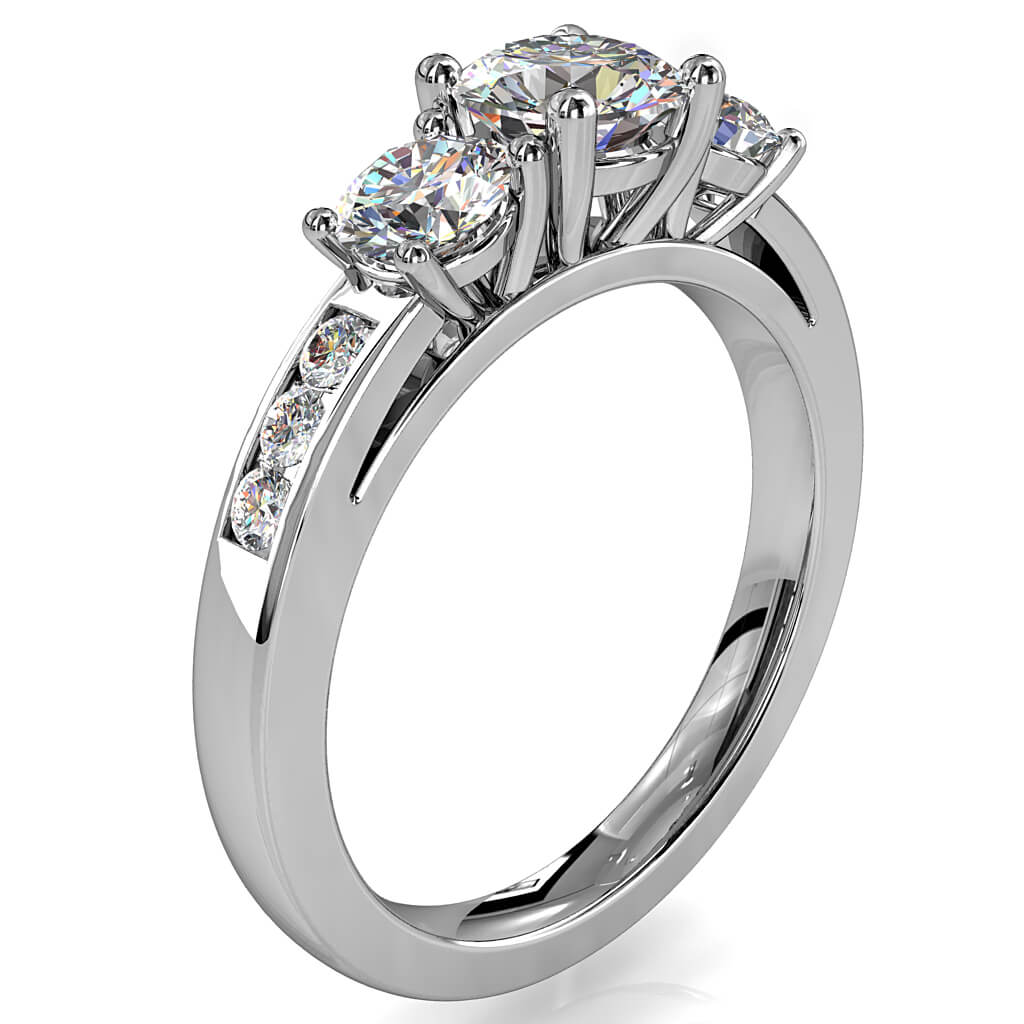 Round Brilliant Cut Diamond Trilogy Engagement Ring, Stones 4 Claw Set on a Channel Set Band with a Classic Underrail Setting.