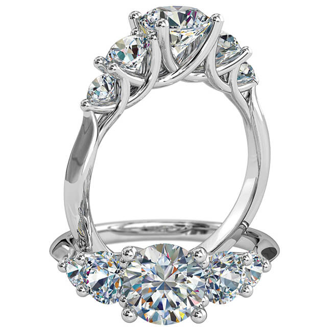 Round Brilliant Cut Diamond Trilogy Engagement Ring, 4 Claw Set Centre Stones with 3 Claw Set Side Stones on a Fine Tapered Band with an Undersweep Setting.